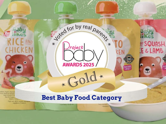 Official Gold Award logo from Project Baby Awards 2025, displayed in front of Baby Likes halal organic baby food pouches, celebrating best baby food win